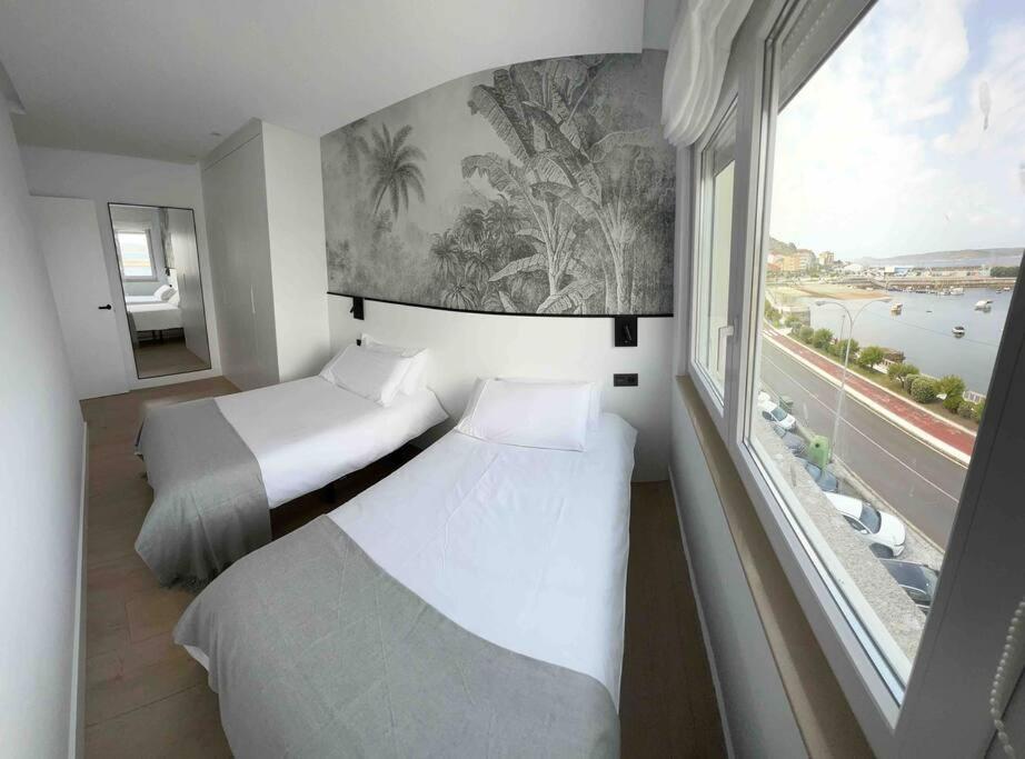 Malecon 47 Apartamento Reformado En Primera Linea Appartement Muxia Buitenkant foto